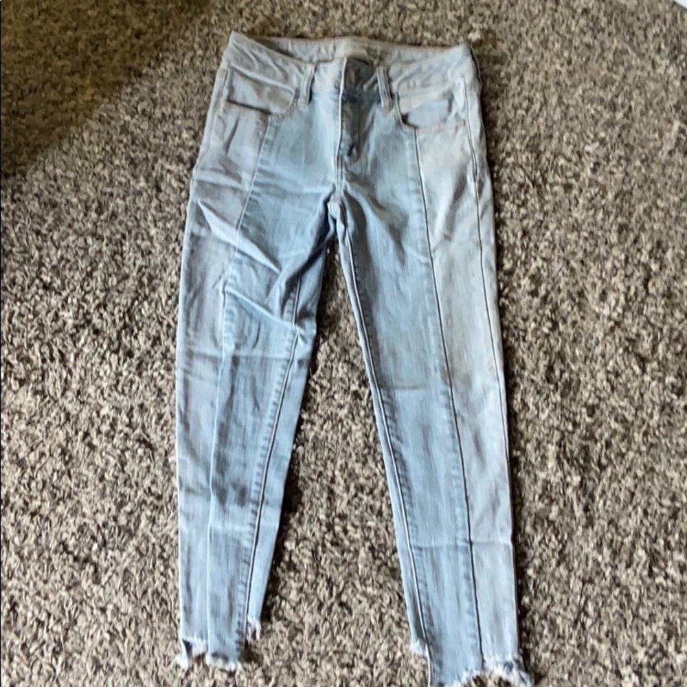 two colored american eagle jeans